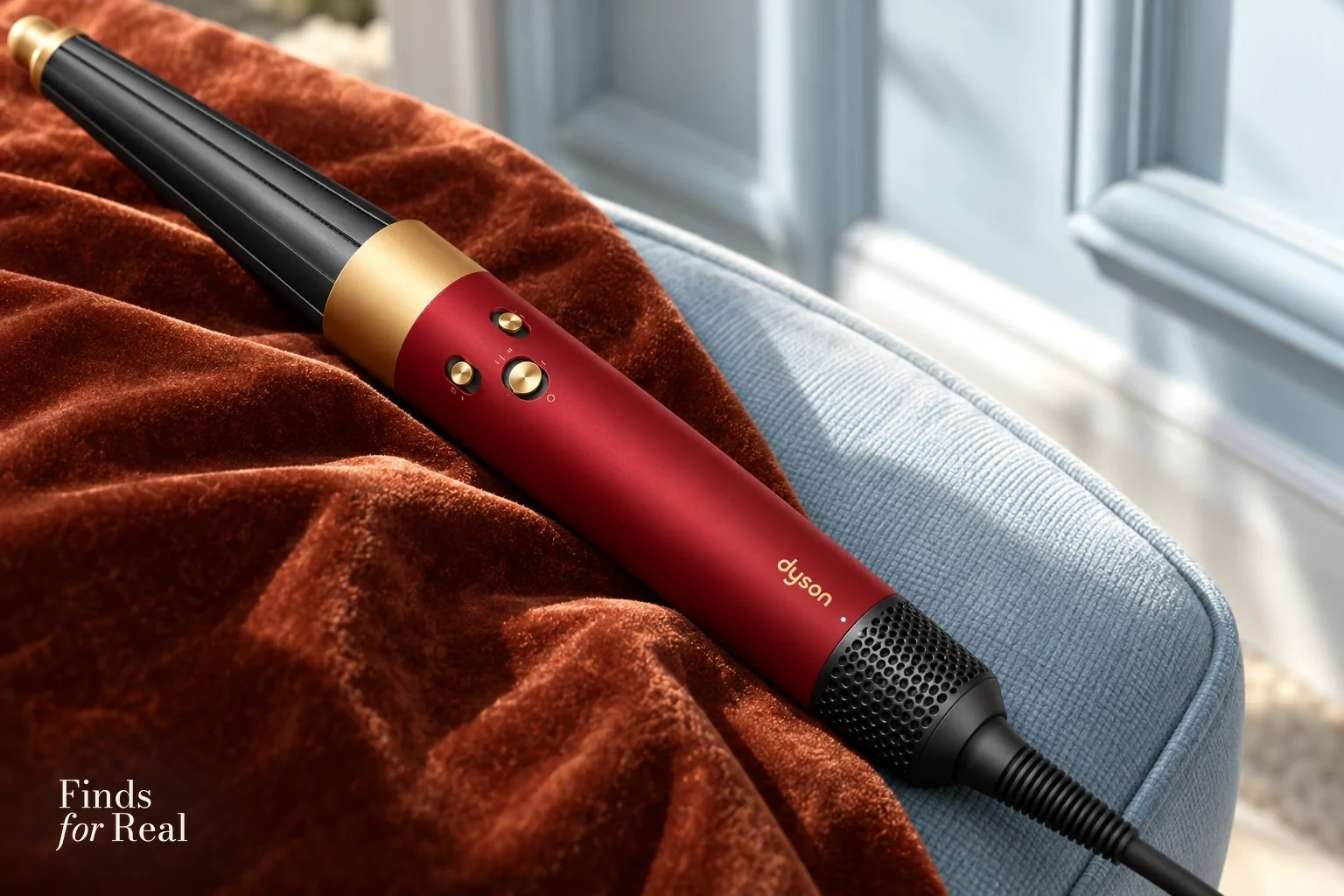 The Airwrap i.d. handle and controls in Red Velvet and Gold.